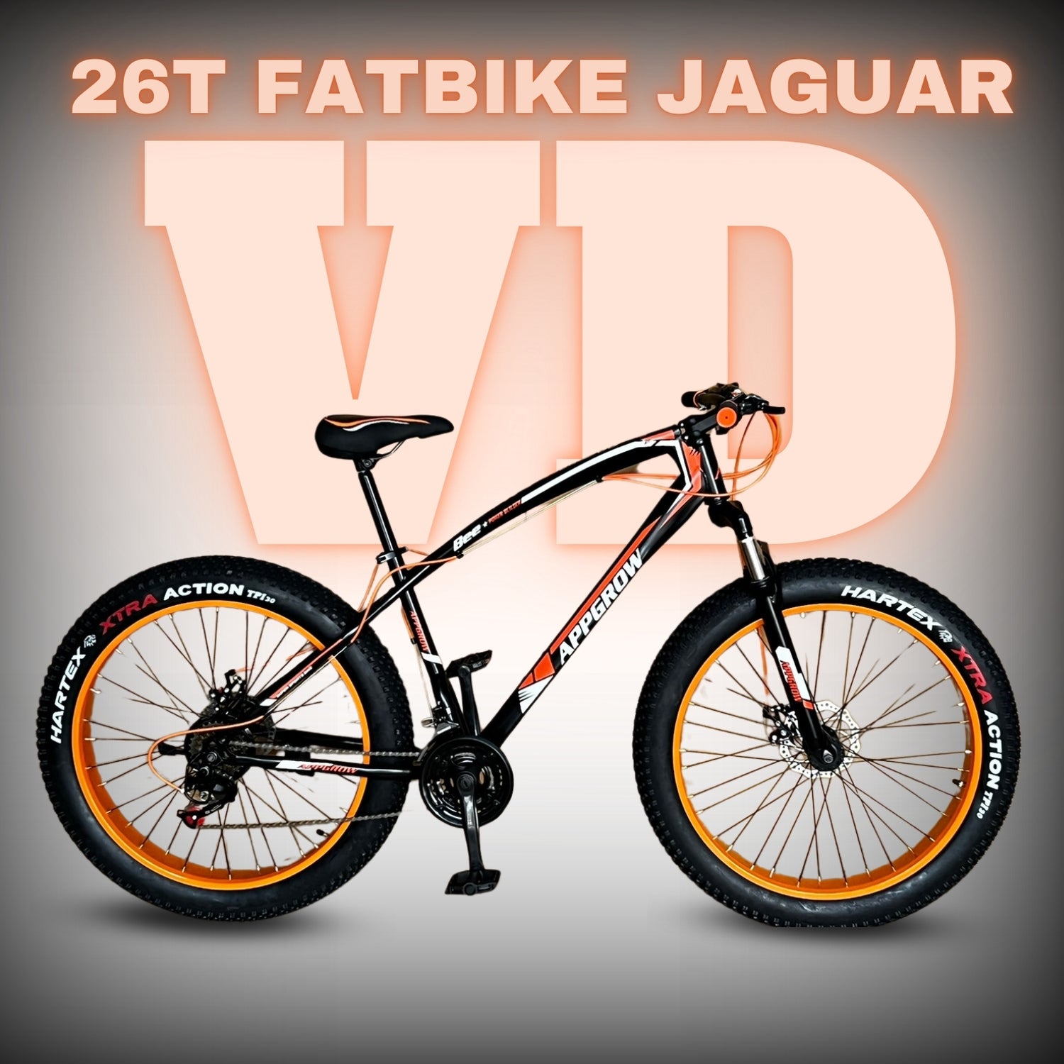 "Appgrow Jaguar 26T fatbike in black and orange with 21-speed gears, dual disc brakes, and XTRA ACTION fat tyres – ideal for off-road adventures."