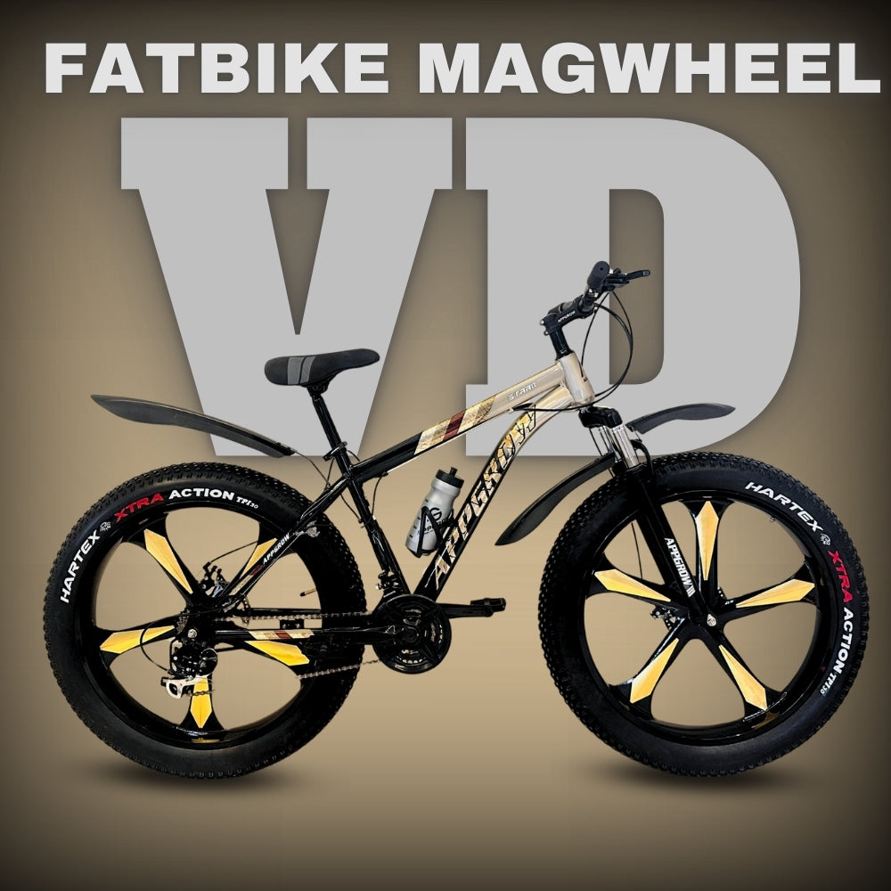 A fatbike with black frame and gold accents, featuring magnesium rims and nylon tires, displayed against a beige background with the text 'FATBIKE MAGWHEEL VD'.