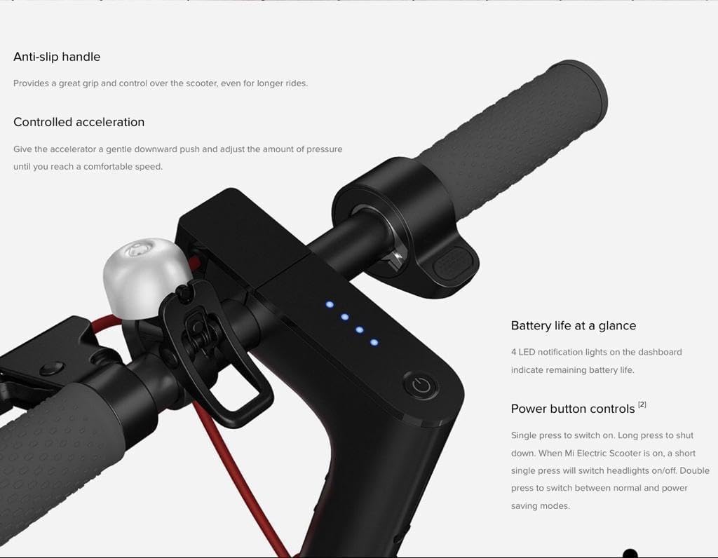 Close-up of electric scooter handlebar showing anti-slip grip, battery indicator LEDs, and power control button.


