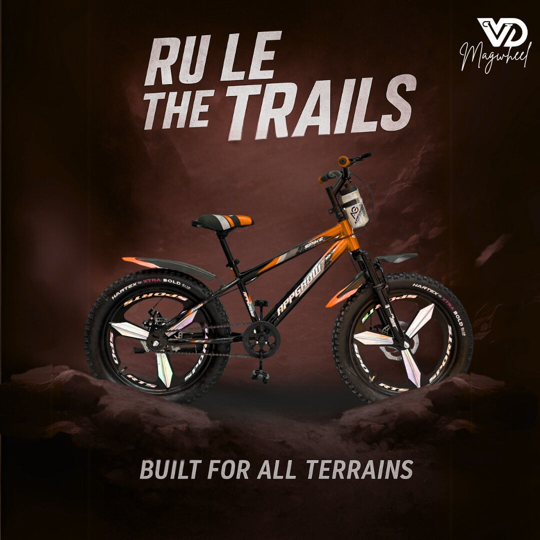 Appgrow 20T Spike orange fatbike with magwheels, designed for all terrains, displayed on a rugged orange landscape with the text ‘RULE THE TRAILS’ and ‘BUILT FOR ALL TERRAINS’.
