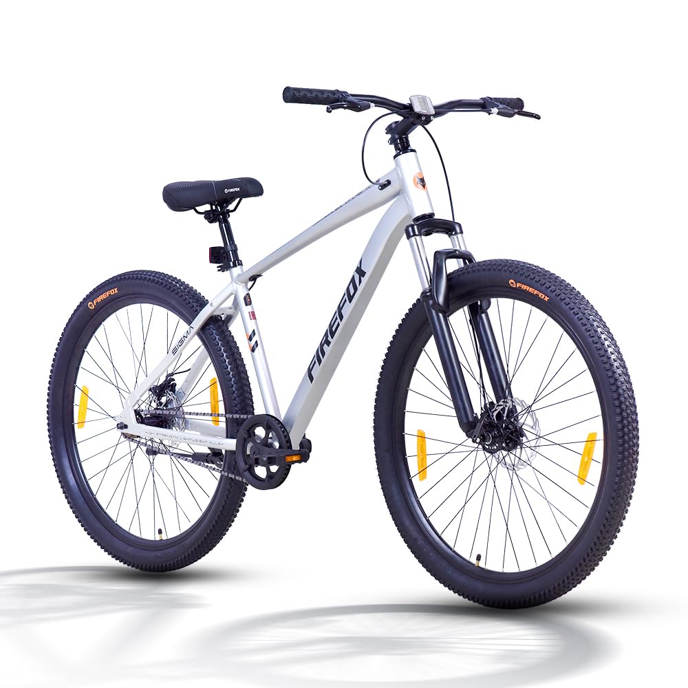 Firefox Bad Attitude 10D 29T mountain bike in silver color with disc brakes, front suspension, and performance tires.
