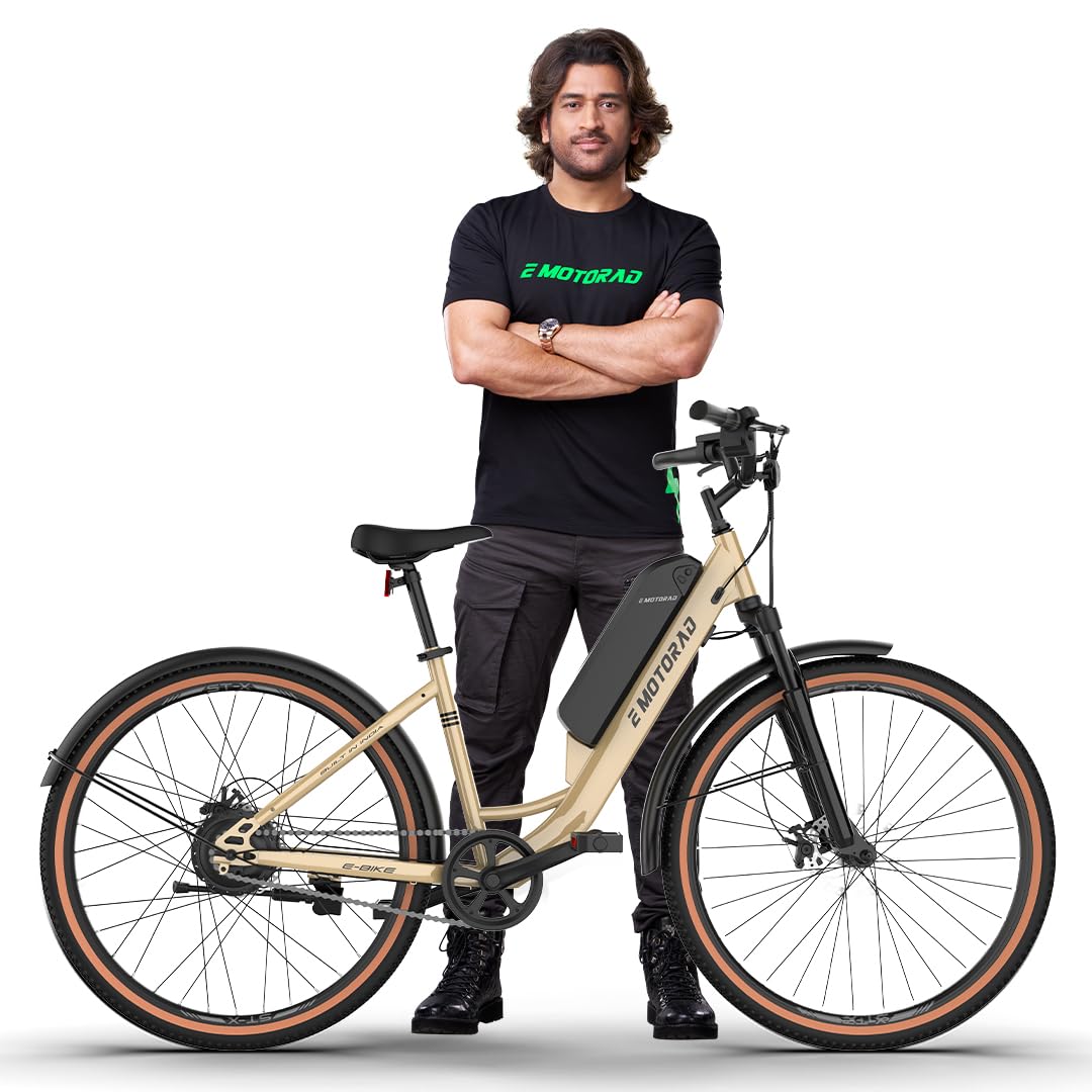 Brand ambassador standing next to E Motorad ST-X Beige Electric Cycle with removable battery and step-through frame

