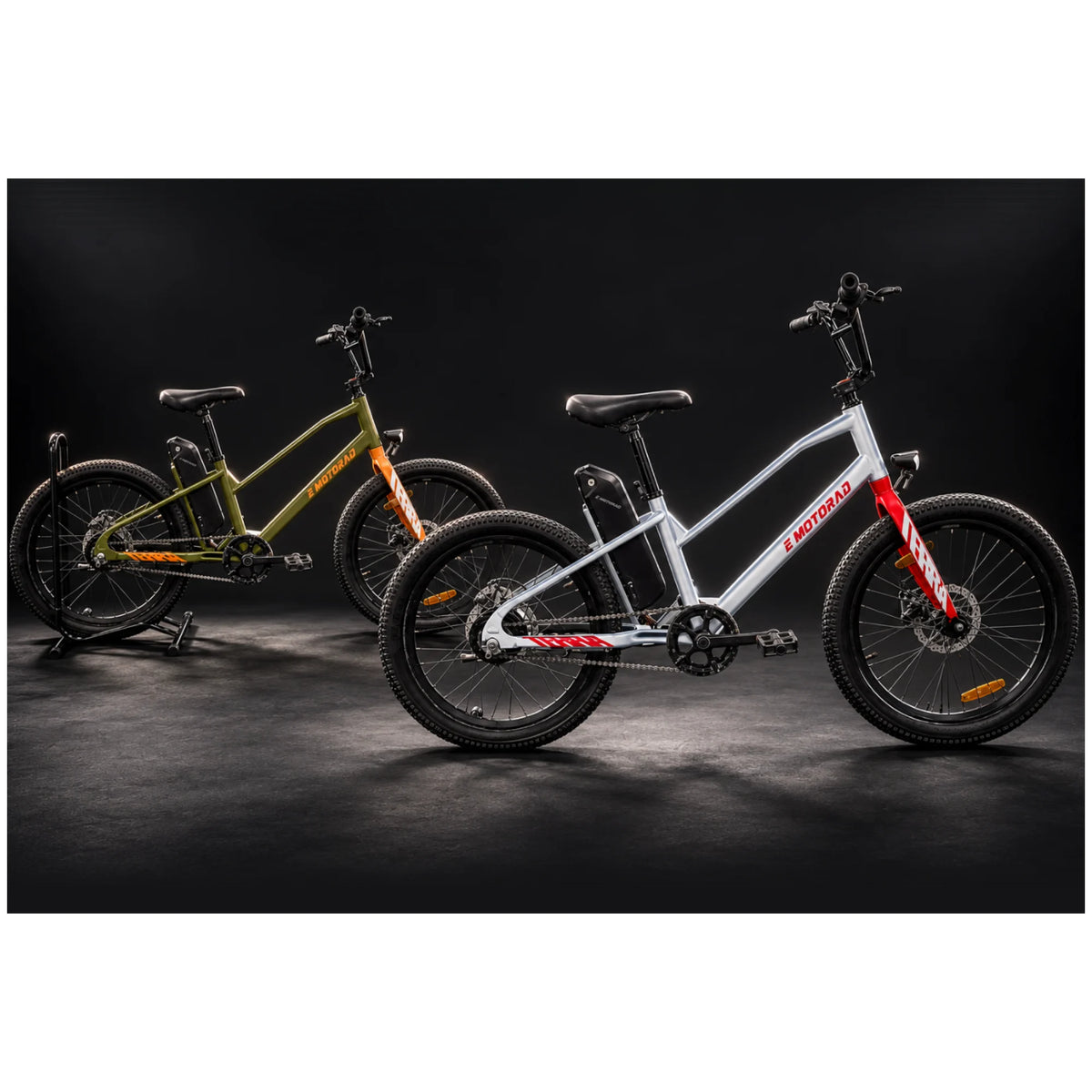 EMotorad Terra electric cycles displayed in olive green and white colour options