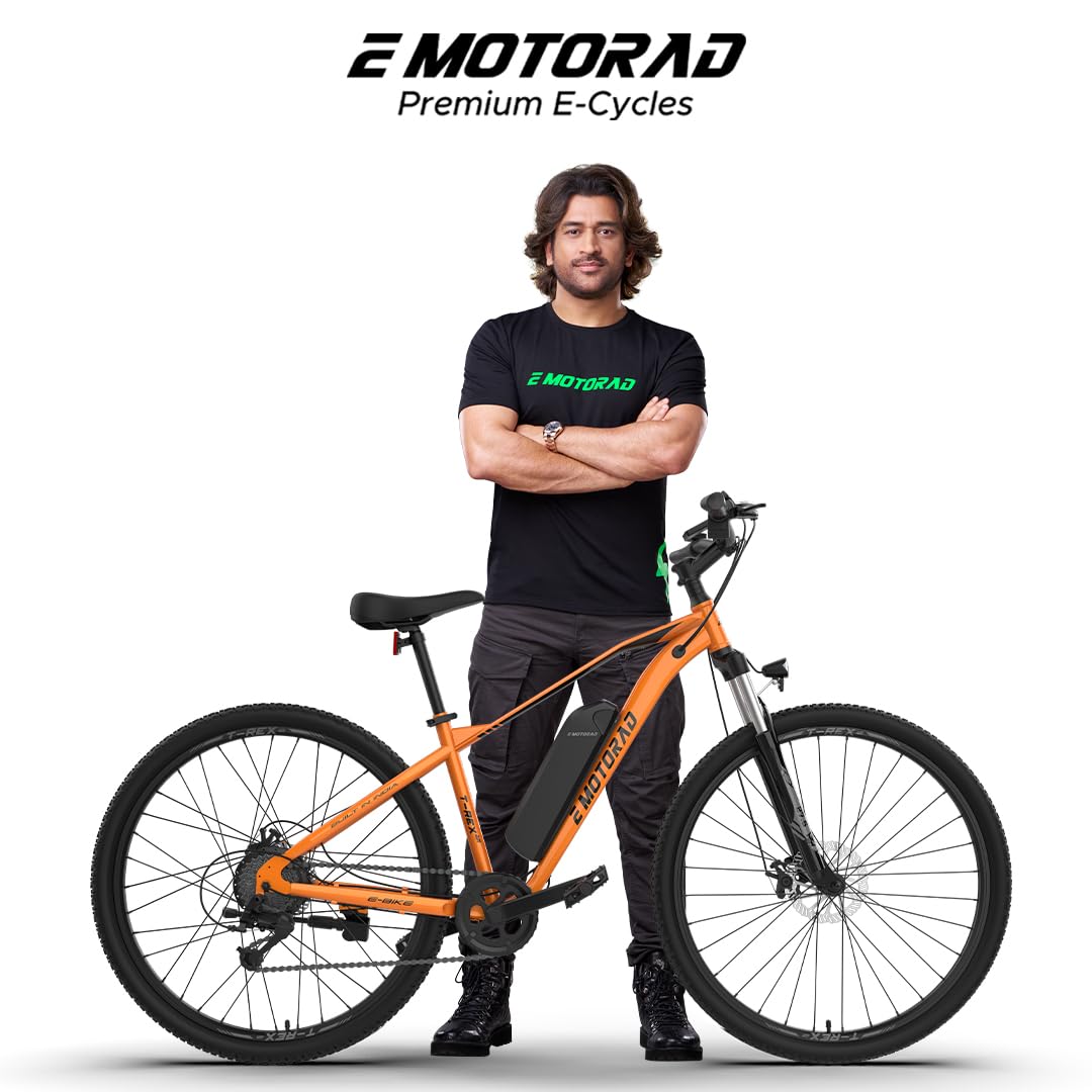 EMotorad T Rex Air electric cycle Orange Blaze color front side view with rider