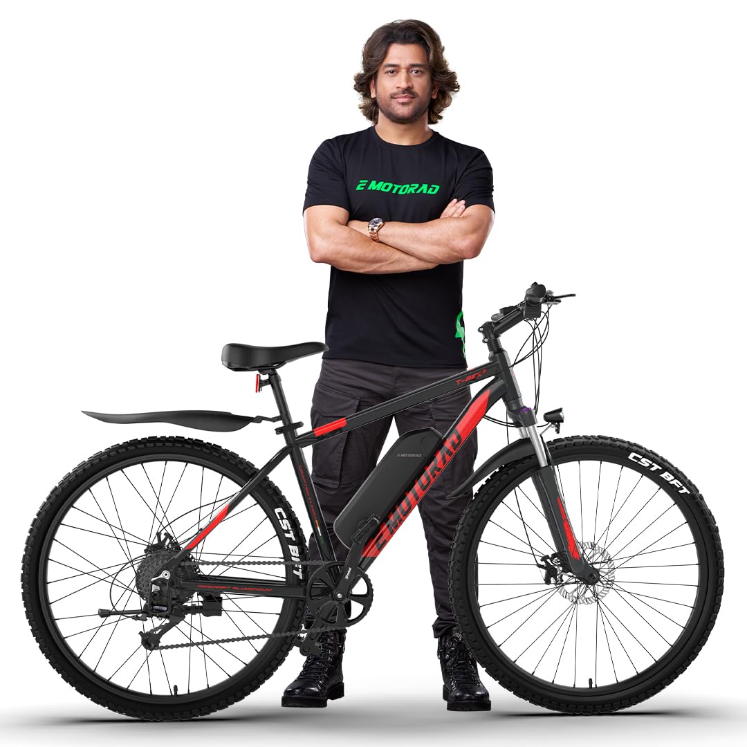 "Man standing with EMotorad TRex+ electric cycle in Crimson Black color, showcasing the aluminum frame, battery pack, and CST tires."

