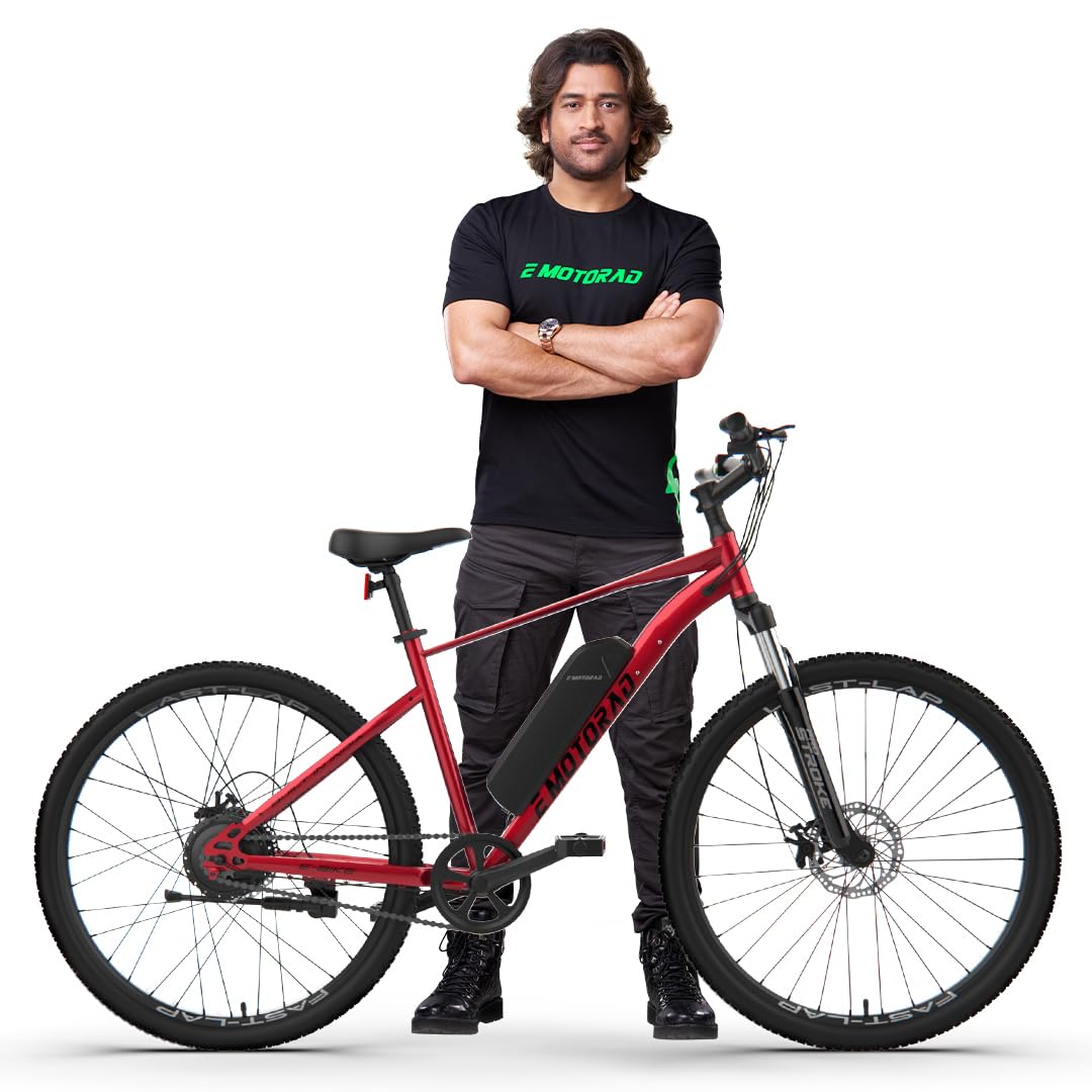 "Full side shot of EMotorad X1 with MS Dhoni posing beside – premium electric MTB cycle"

