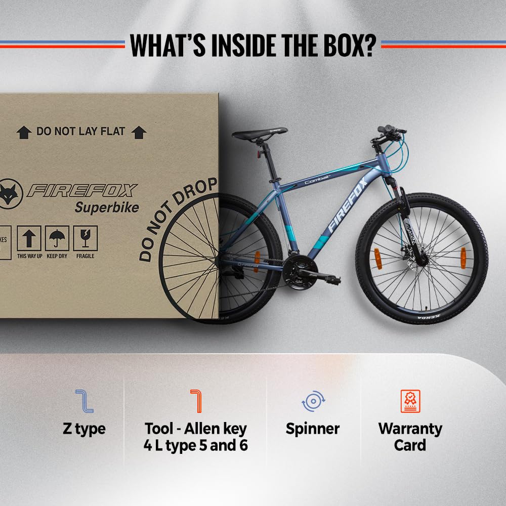 Firefox Combat bicycle box contents including toolkit, Allen keys, spinner and warranty card