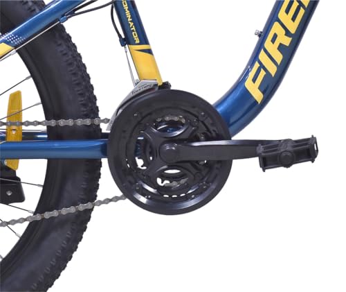 Close-up view of the Firefox Dominator 24D's pedal and crankset with chainring, showcasing the drivetrain and part of the frame graphics.
