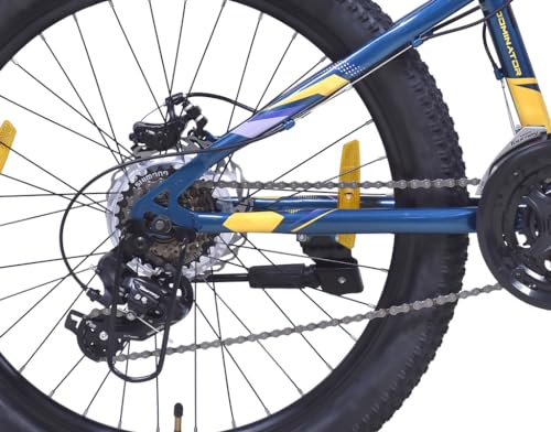 Close-up of the rear gear and derailleur system on the Firefox Dominator 24D mountain cycle, highlighting the chain and cassette.
