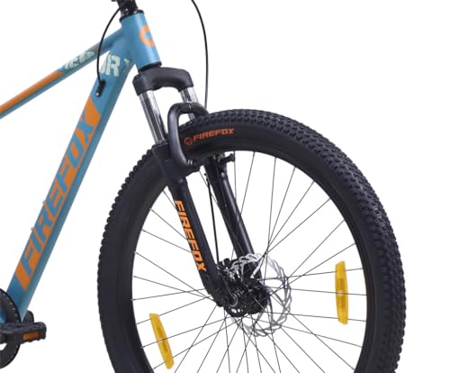 Front fork and tyre section of the Firefox Dominator 24 D single-speed cycle, showcasing disc brakes, orange reflectors, and blue-orange frame design against white background

