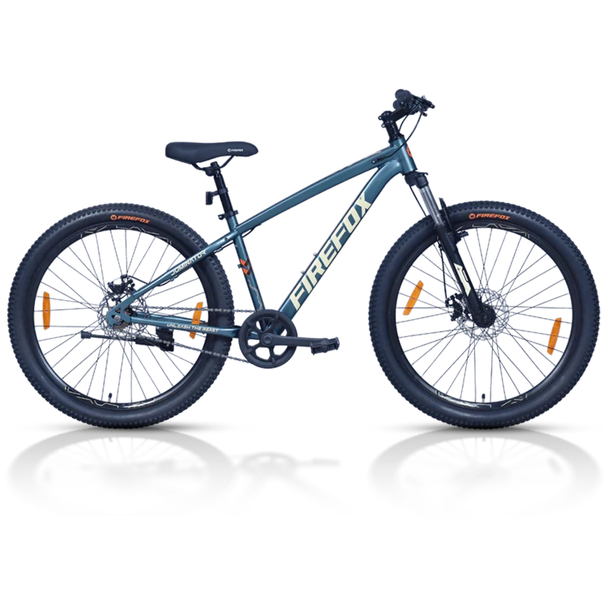A Firefox brand mountain bike in a dark teal-blue color, featuring a black seat, black handlebars, and black knobby tires with orange reflectors, shown on a white background with a soft reflection.