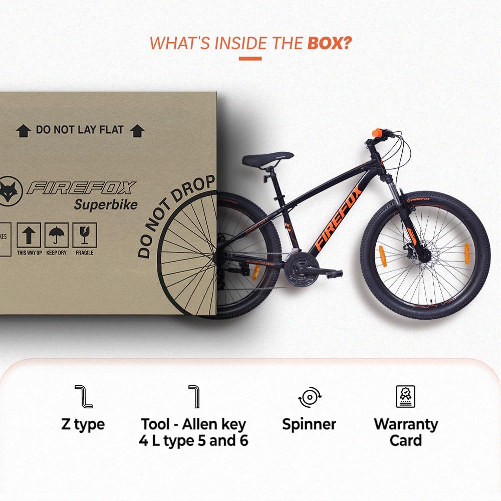 Firefox Dominator Plus cycle box contents including tools spanner allen keys and warranty card