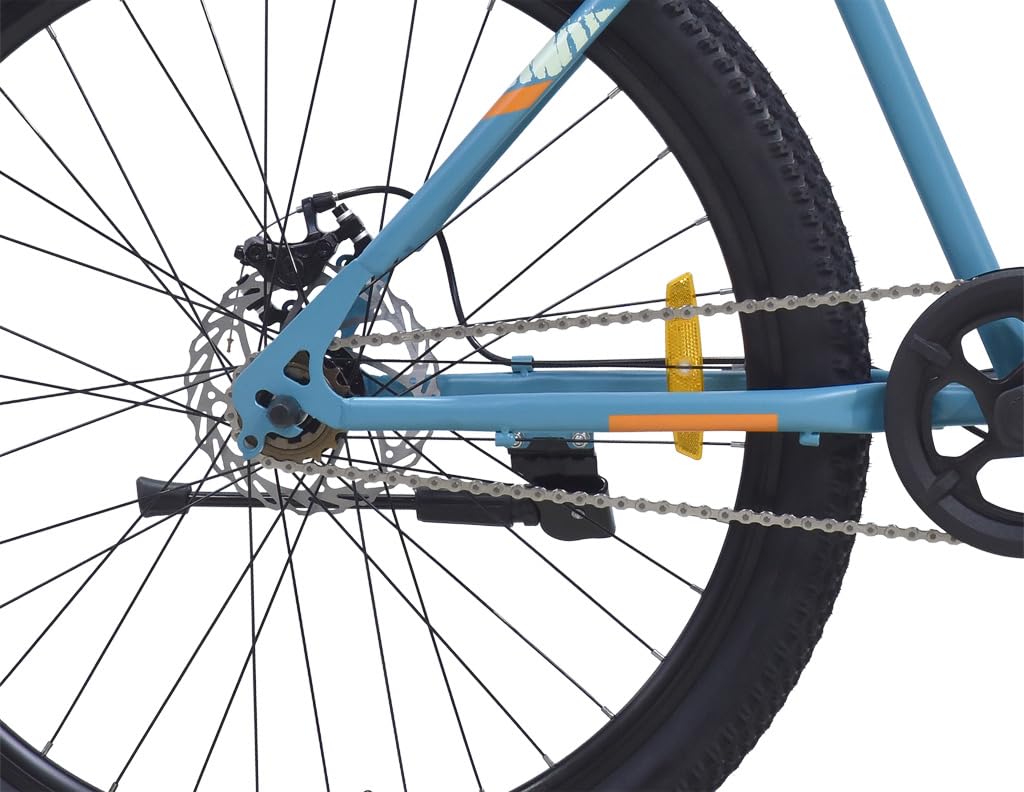Close-up of Firefox Dominator rear wheel with single-speed chain, disc brake, and frame detailing, against a white background

