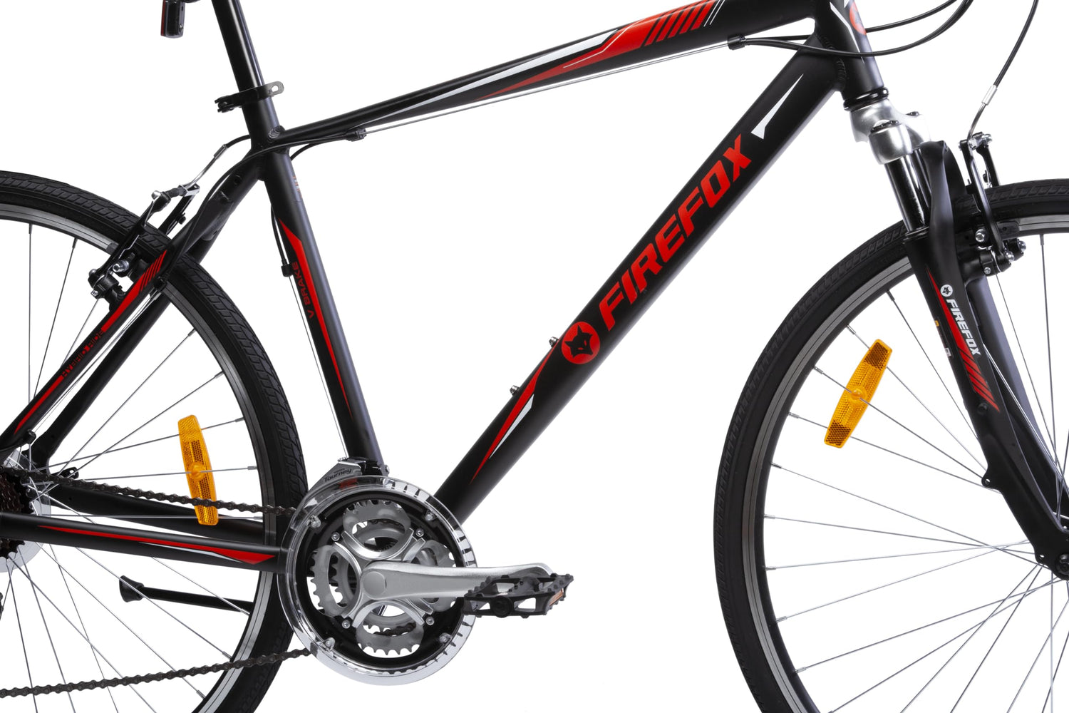Side view of Firefox hybrid bike showing alloy frame, front suspension fork, and red Firefox branding on matte black body.
