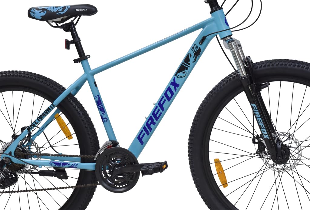 Side angle view of Firefox Tremor X 27.5 D mountain cycle showing full frame, disc brakes, gears, and suspension fork.


