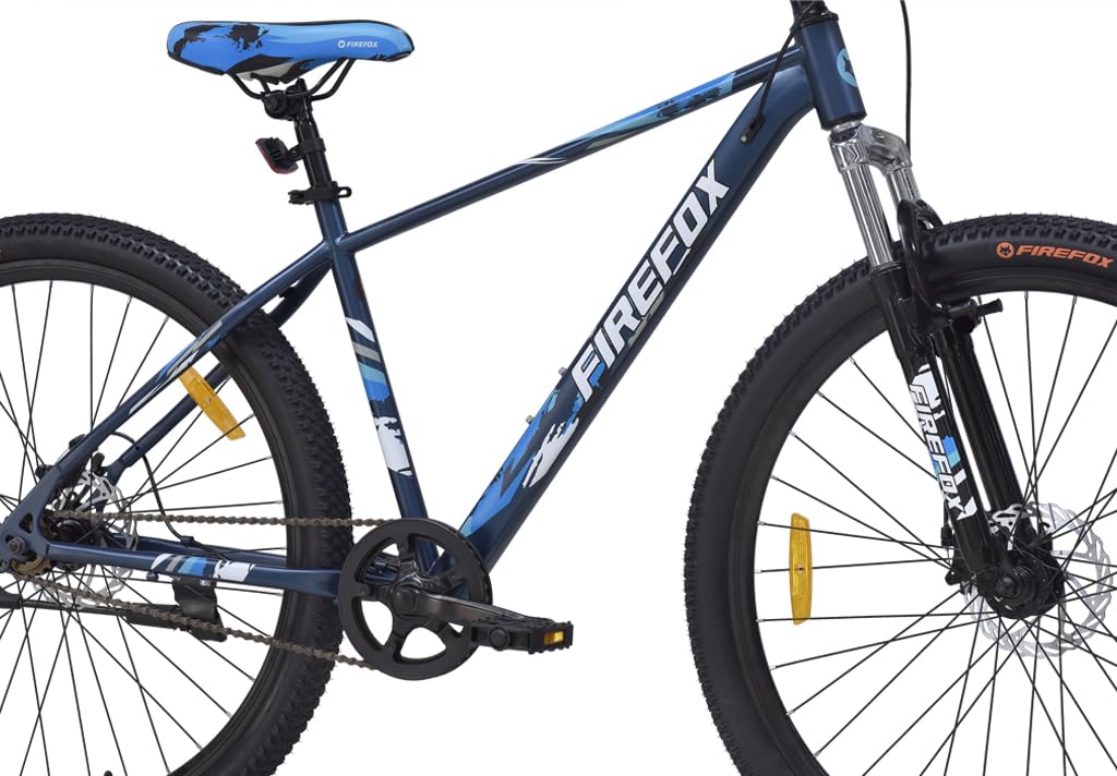Side profile of the FIREFOX Tremor X 29 D geared mountain cycle in blue, featuring front suspension, dual disc brakes, and 29-inch tires against a white background.

