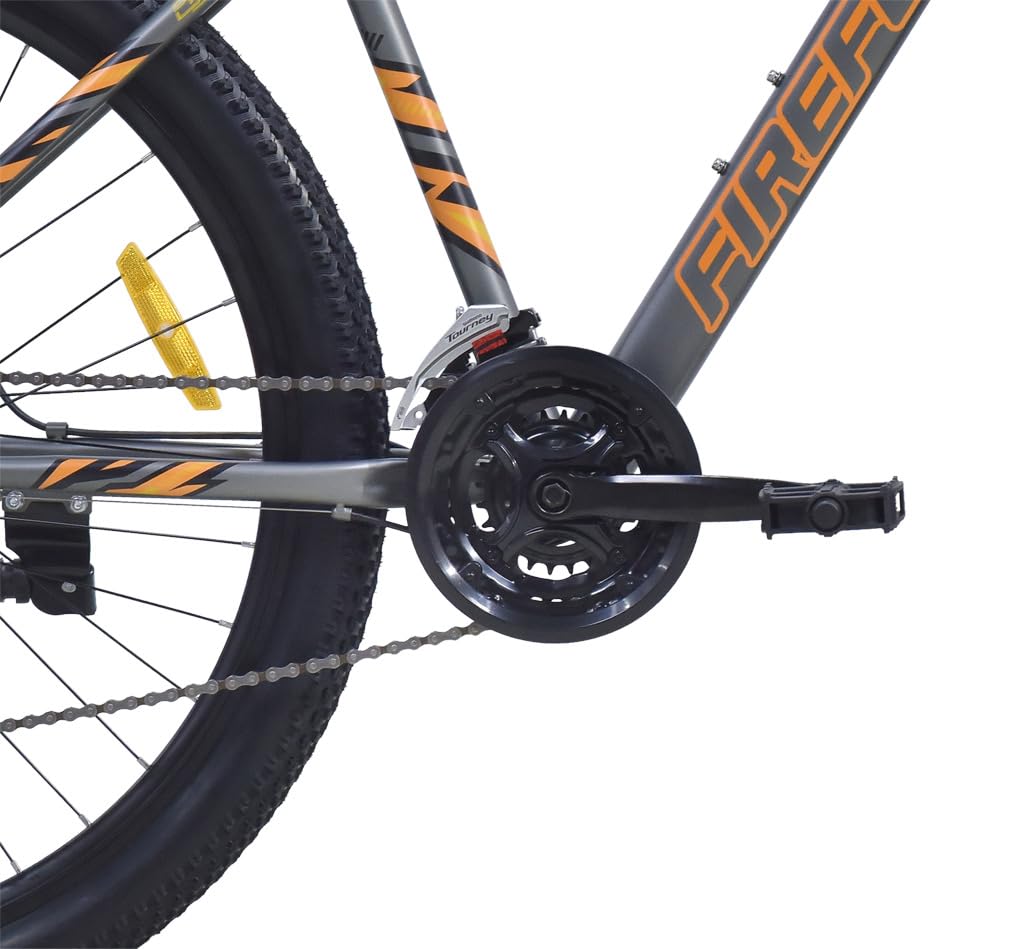 Close-up of FIREFOX Tremor X 29 D crankset, pedal, and chainring with branding on alloy frame.
