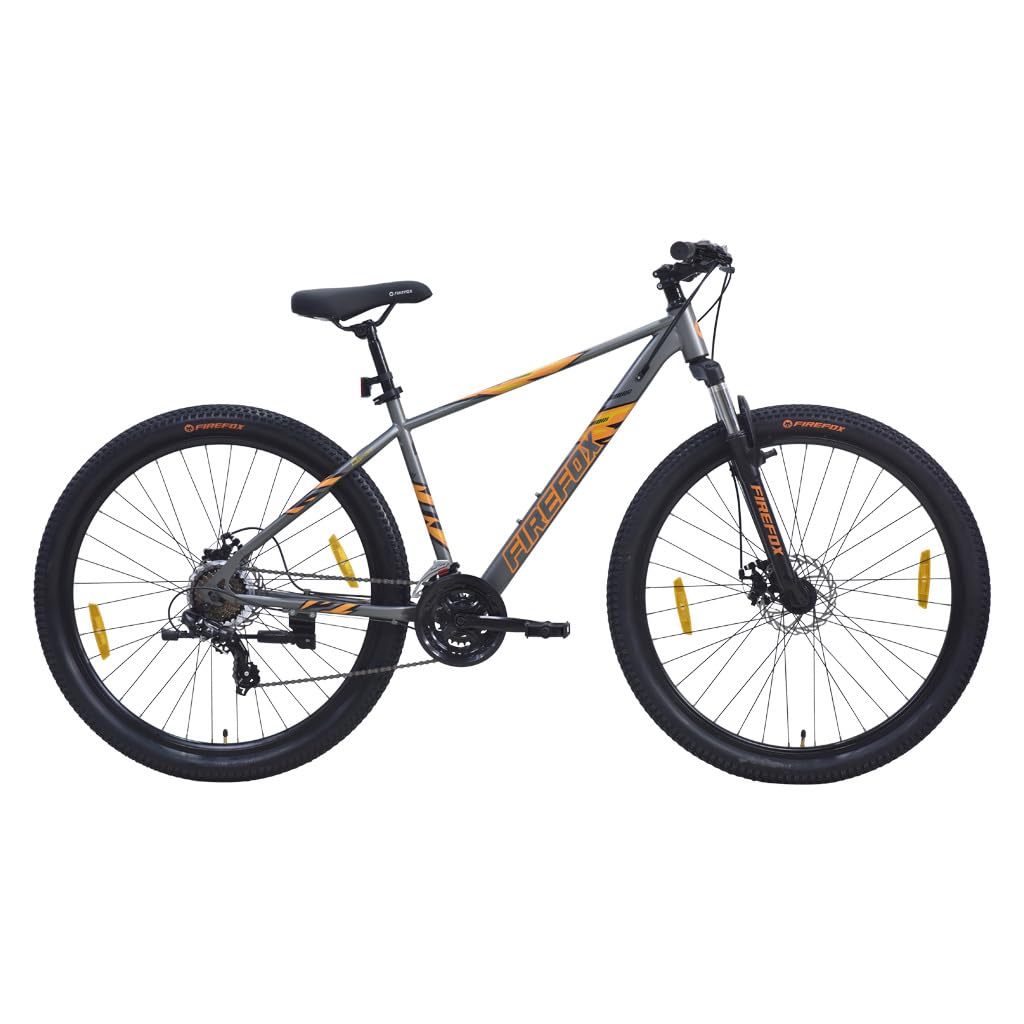 Side view of FIREFOX Tremor X 29 D mountain cycle in grey and orange, with 21 gear system, disc brakes, and 29-inch wheels – 98% assembled and ideal for men.
