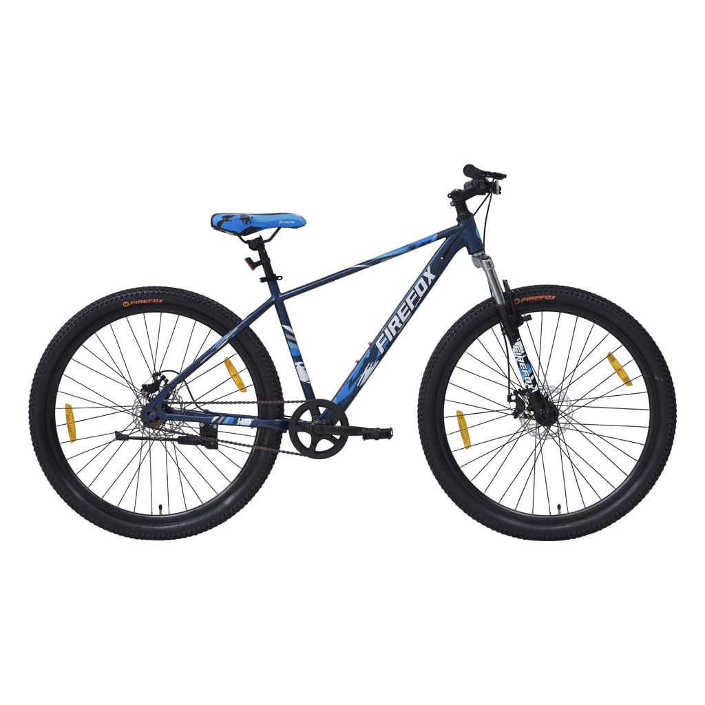 Full side view of the FIREFOX Tremor X 29 D single speed mountain cycle in blue with disc brakes, front suspension, and black alloy wheels.
