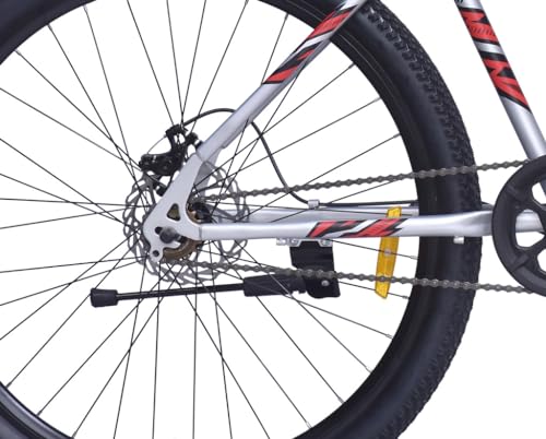 Close-up of rear wheel, hub, disc brake and chain system of FIREFOX Tremor X 29 D single speed cycle in silver.
