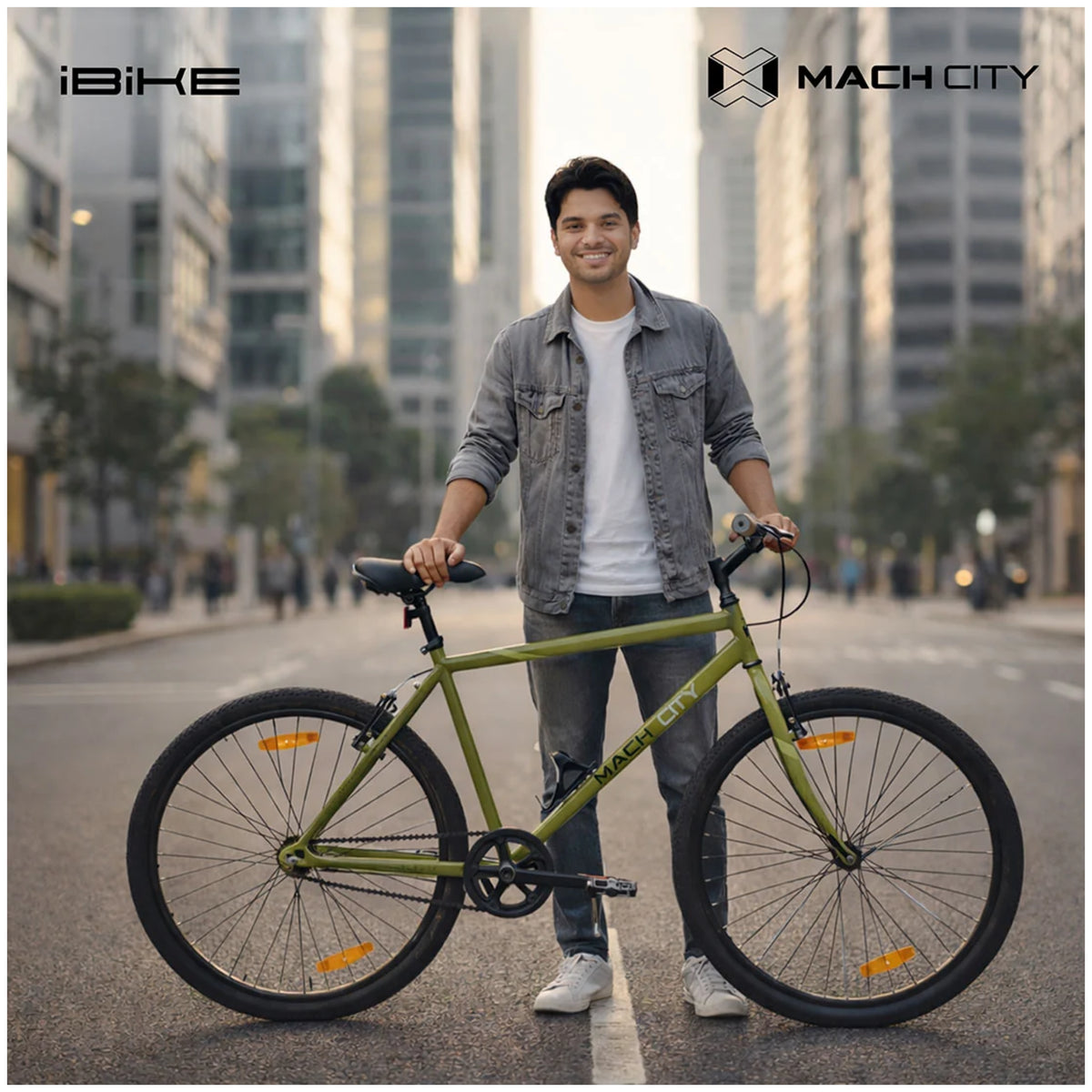 Mach City iBike 26T Olive Green city cycle with male rider