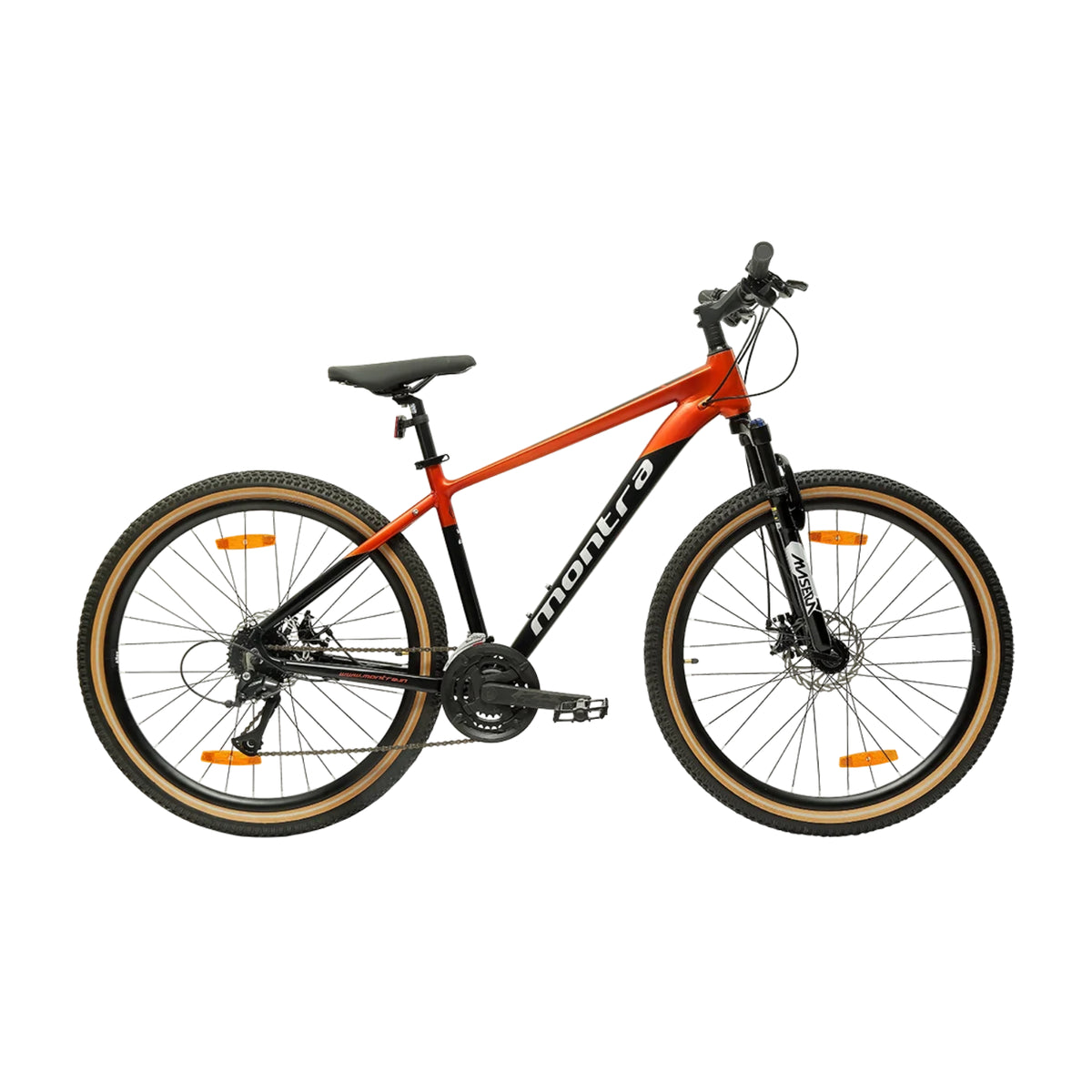 Montra Metal orange MTB cycle side view with front suspension and dual disc brakes