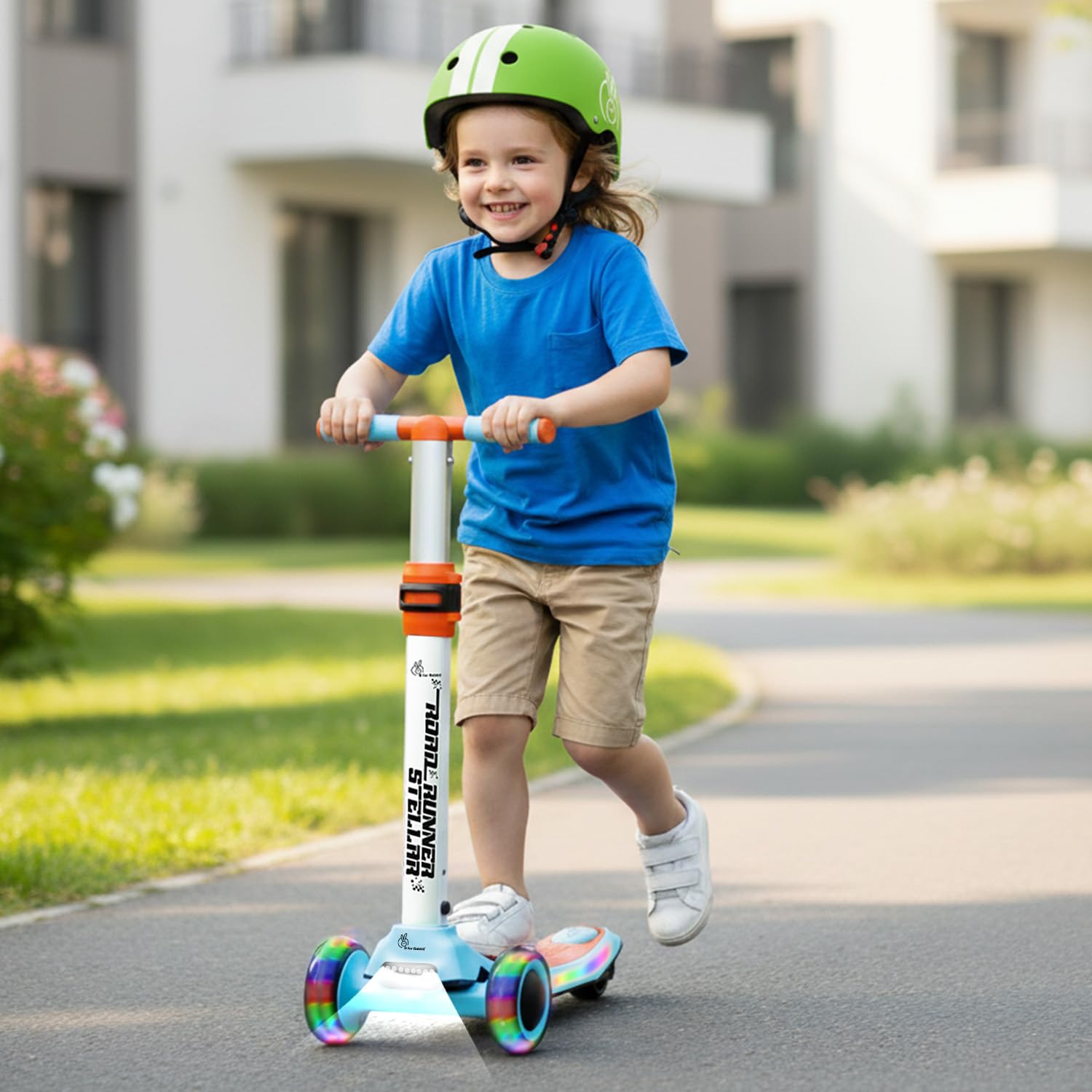 Kid riding R for Rabbit Stellar scooter with LED wheels outdoors