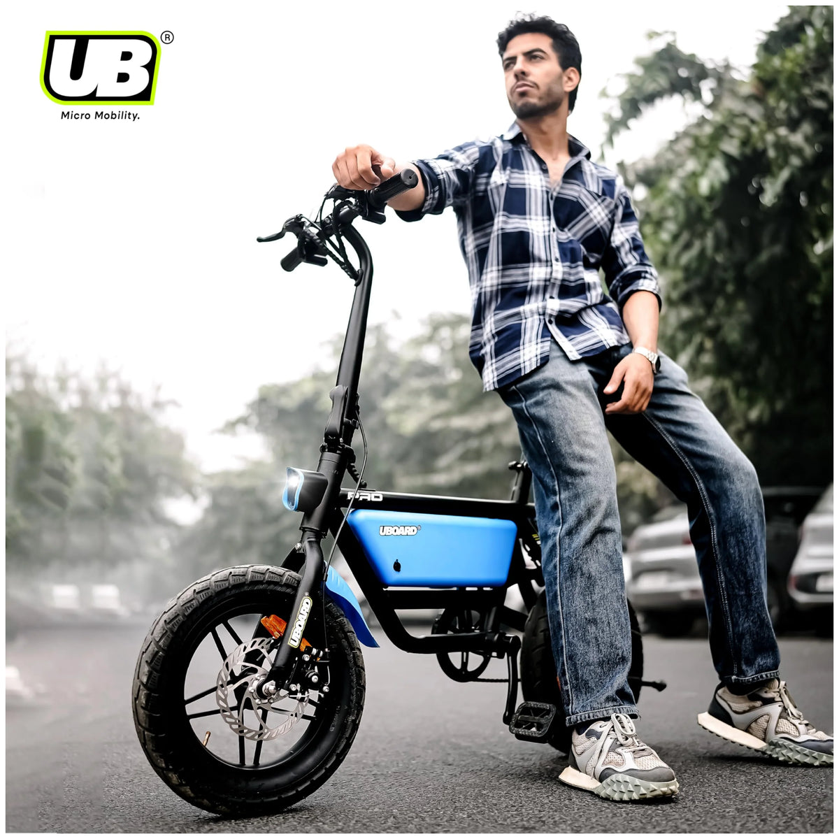 UBOARD Space Bike Pro blue electric cycle with rider